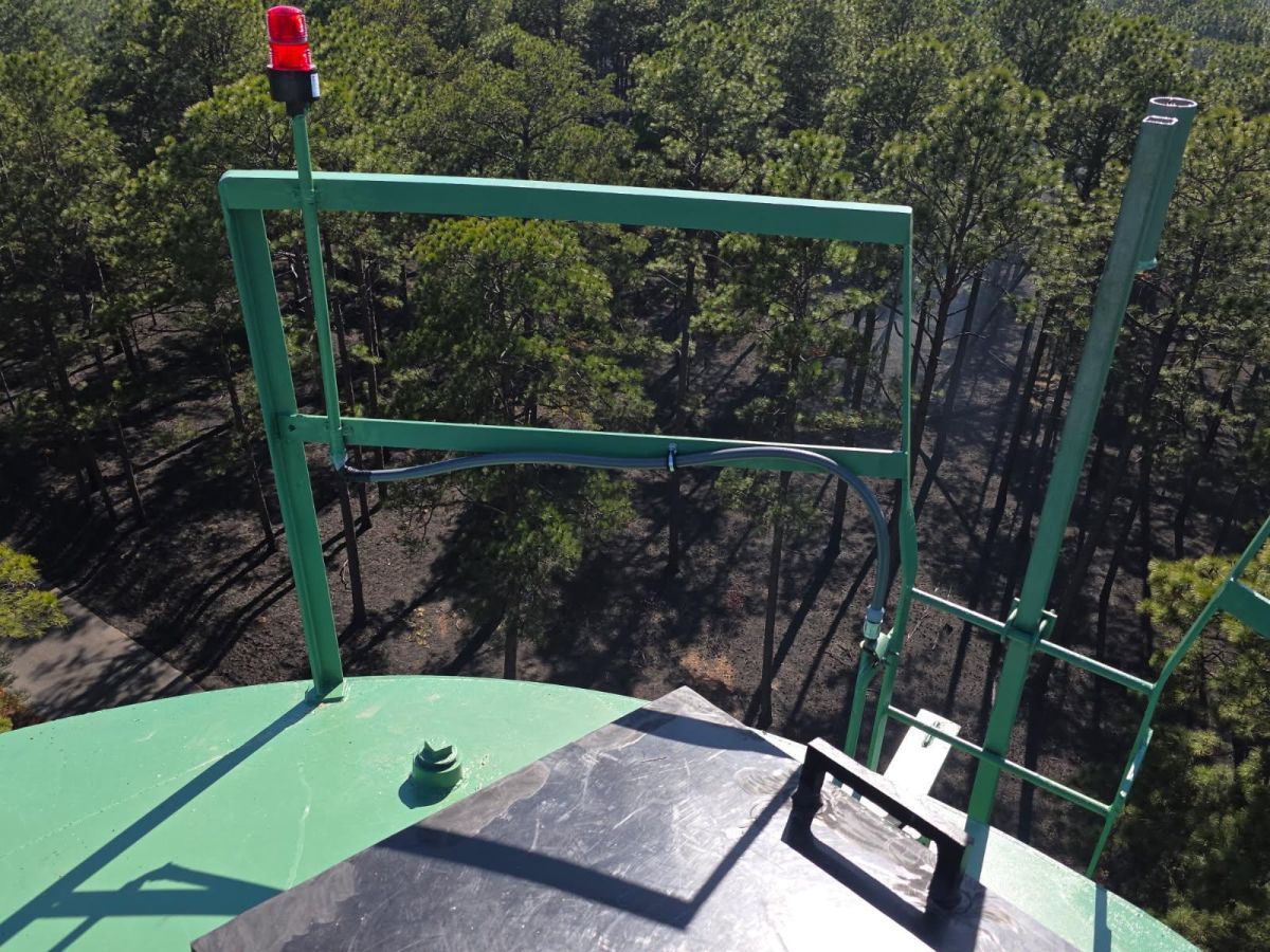 Top of water tank with new red light